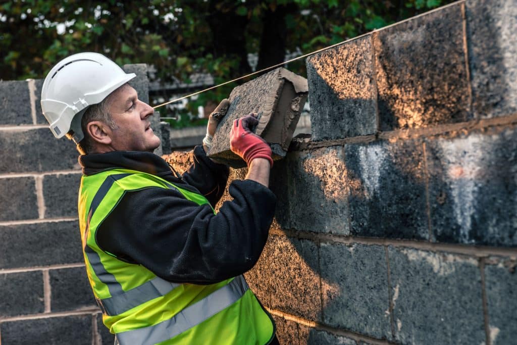 Laying Bricks on a Thailand Construction Site