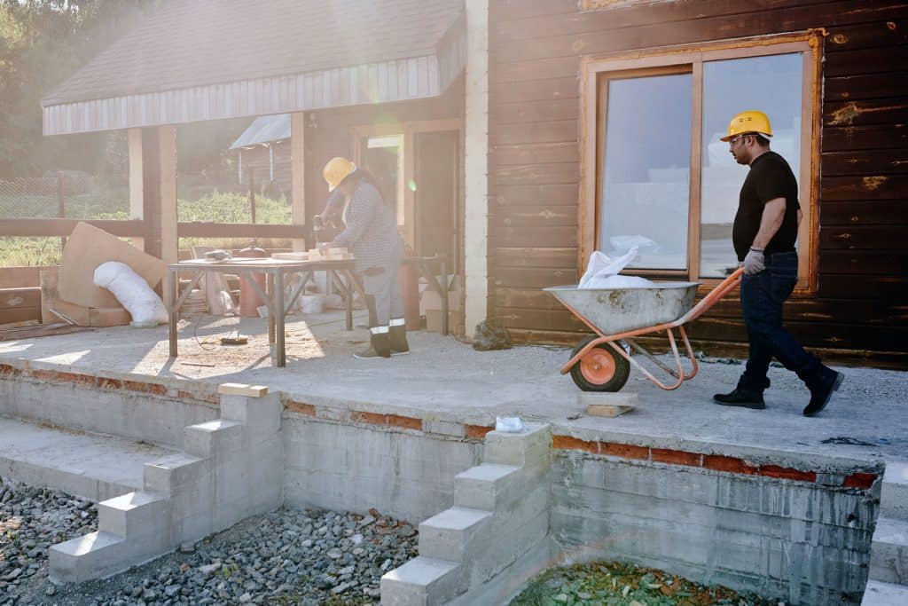 Construction Workers Building a House in Thailand